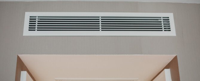 Conditioner air vent grill on the wall.